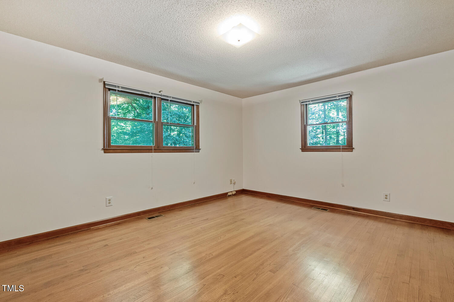 6013 Splitrock Trail Apex, NC 27539 - Photo 30 of 53 an empty room with windows