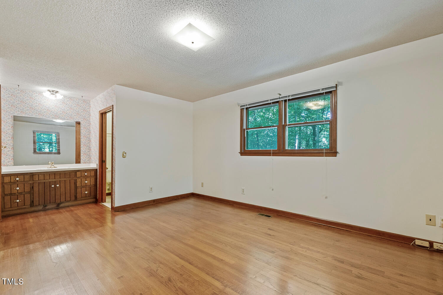 6013 Splitrock Trail Apex, NC 27539 - Photo 32 of 53 an empty room with windows