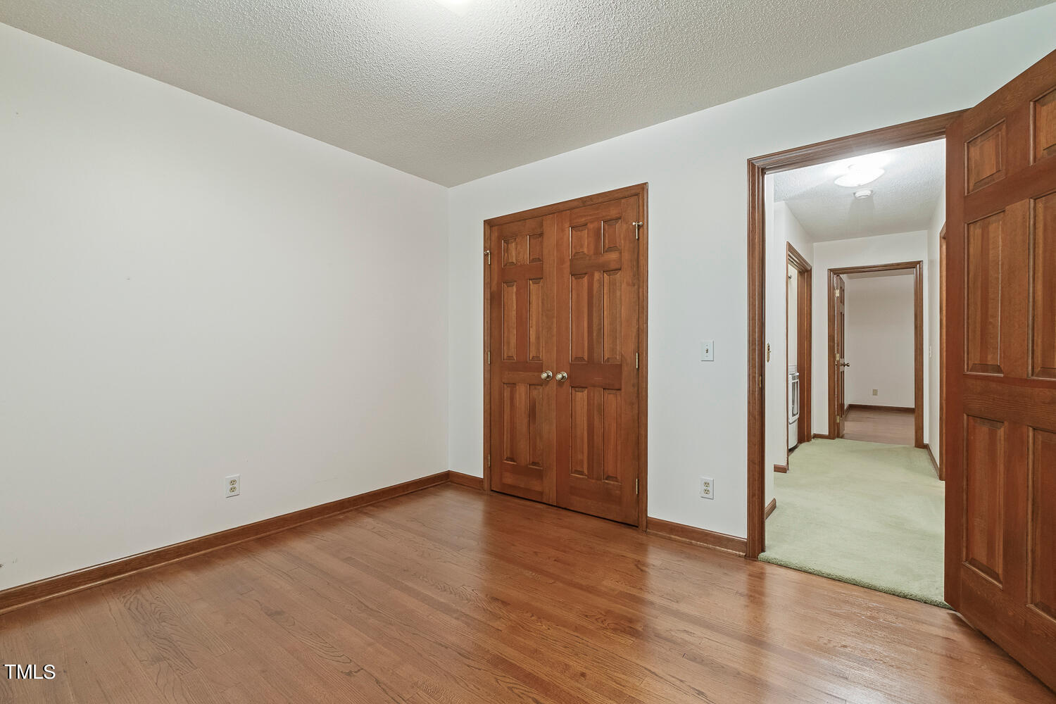 6013 Splitrock Trail Apex, NC 27539 - Photo 35 of 53 a view of hallway with wooden floor