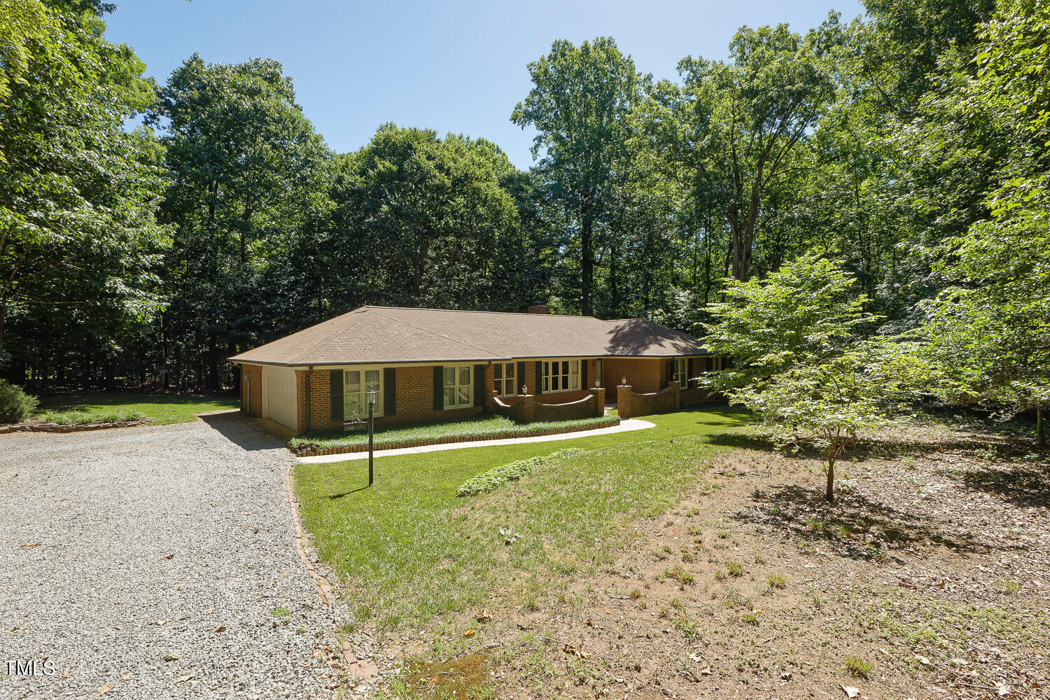 6013 Splitrock Trail Apex, NC 27539 - Photo 52 of 53 a house with trees in the background