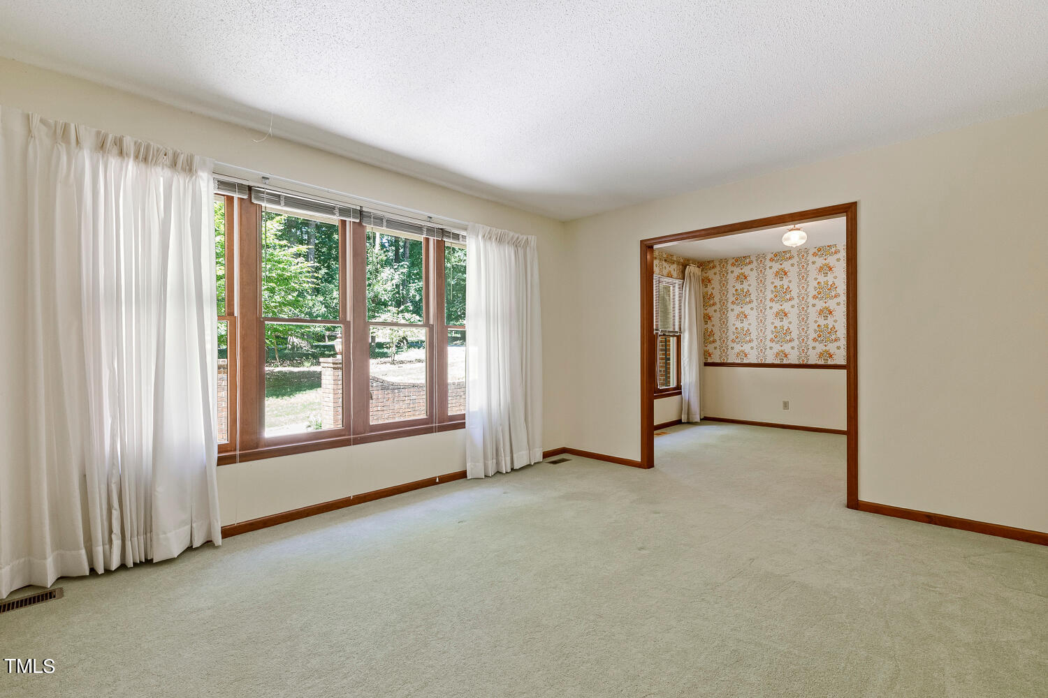 6013 Splitrock Trail Apex, NC 27539 - Photo 9 of 53 an empty room with windows and closet