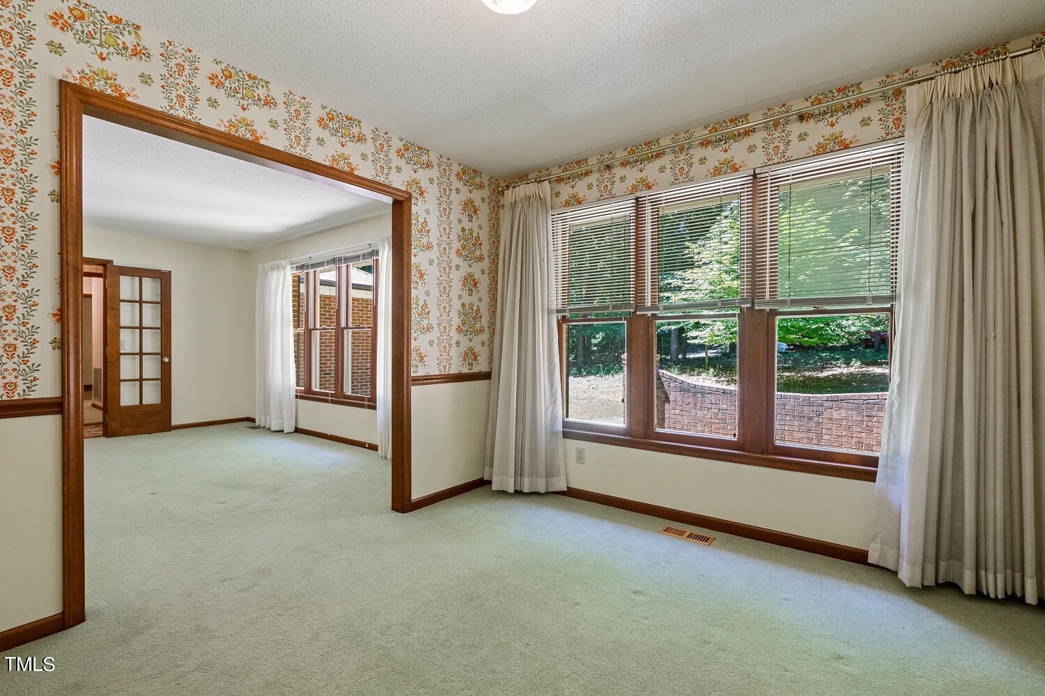 6013 Splitrock Trail Apex, NC 27539 - Photo 10 of 53 a view of livingroom with furniture and windows