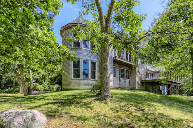 14 Ephriam Allen Road West Tisbury, MA 02568 - Photo 2 of 17 a house that has a tree in front of the house