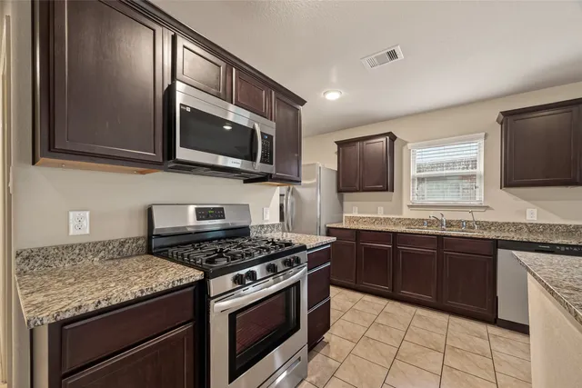 $2,450 | 23506 Umbrella Pine Drive, Tomball, TX 77375