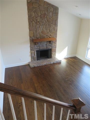 3416 Hackney Court Raleigh, NC 27613 - Photo 14 of 21 a view of fireplace and wooden floor