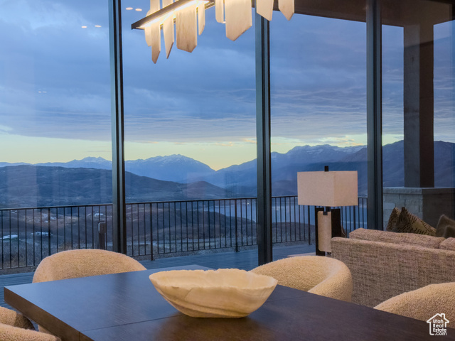 2132 East Outlaw Road, Unit 49 Kamas, UT 84036 - Photo 6 of 44 Dining room featuring a mountain view and a wall of windows