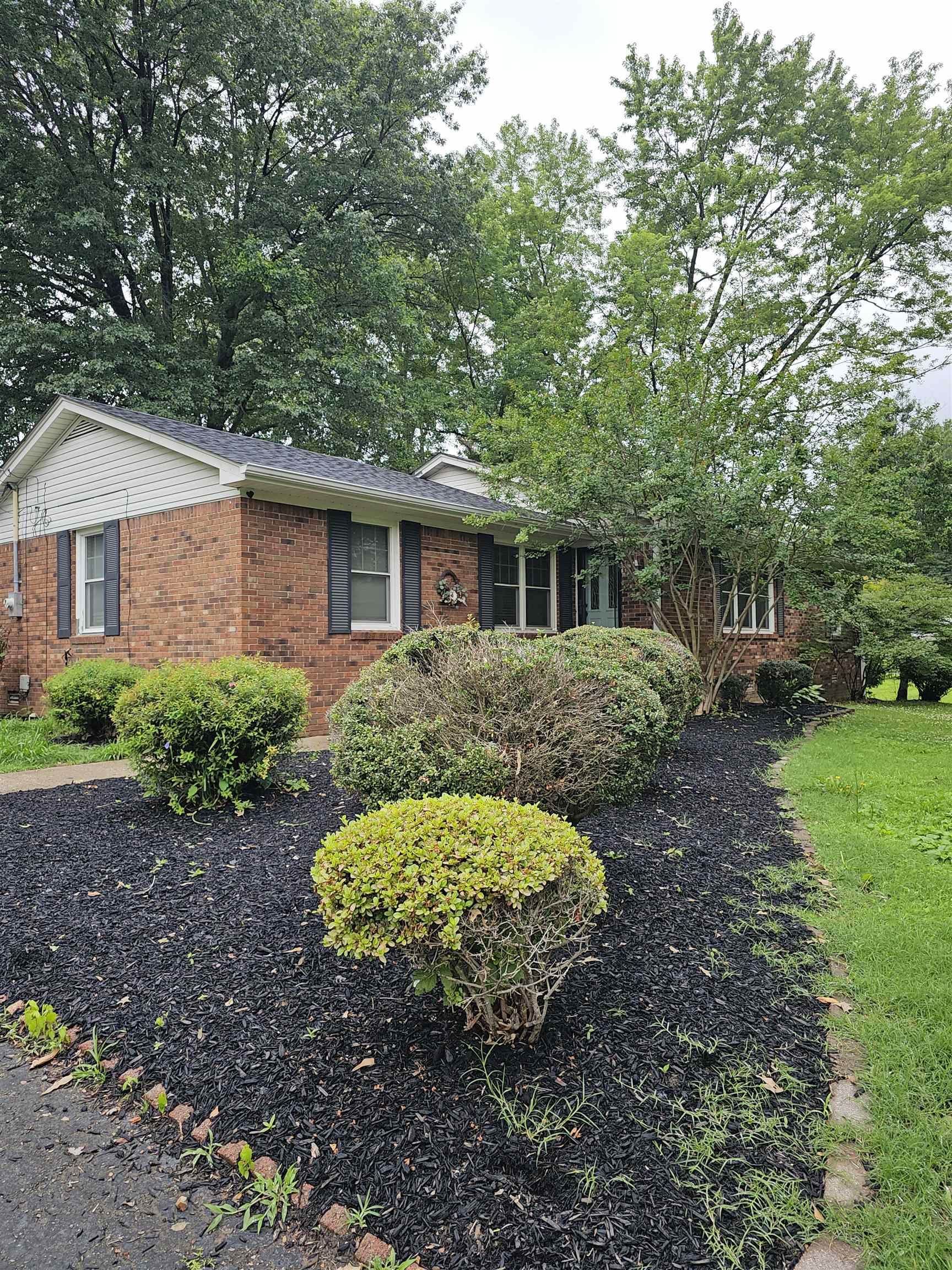 113 Smith Drive Ripley, TN 38063 - Photo 32 of 39 a view of a house with yard and a garden