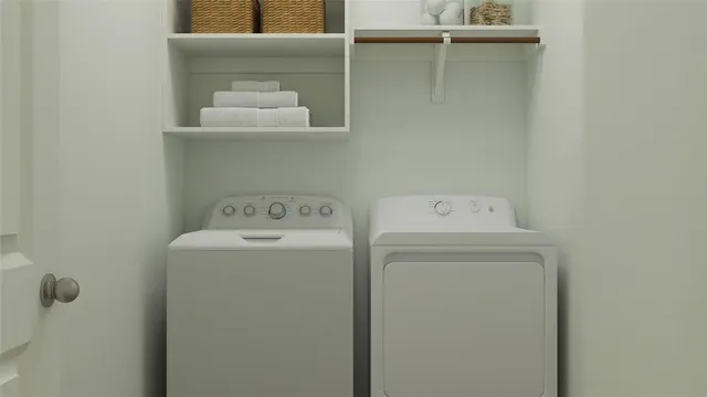 a utility room with dryer and washer