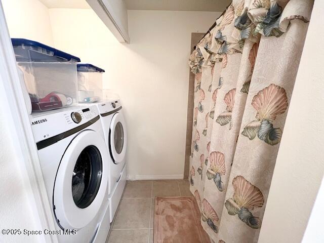 6828 Toland Drive, Unit 205 Melbourne, FL 32940 - Photo 24 of 26 a utility room with dryer and washer