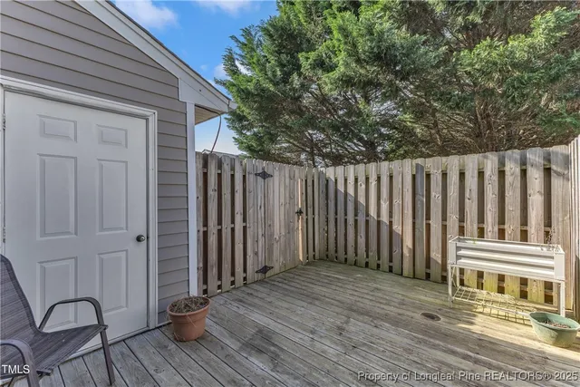 a view of wooden floor in front of house