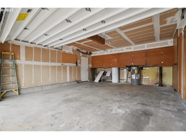 a big room with closet and windows