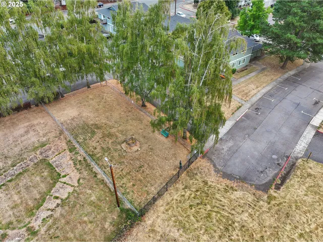 a view of a backyard of a house