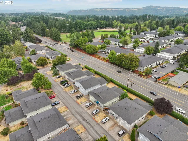 an aerial view of a city with lots of residential buildings