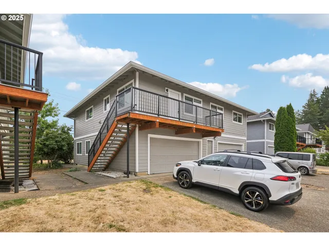 a car parked in front of a house