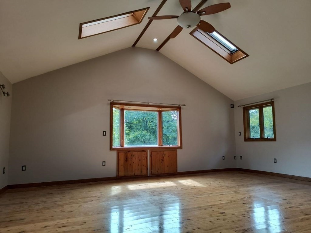 8 Birch Bluff Road Montgomery, MA 01085 - Photo 23 of 41 a view of an empty room with a window