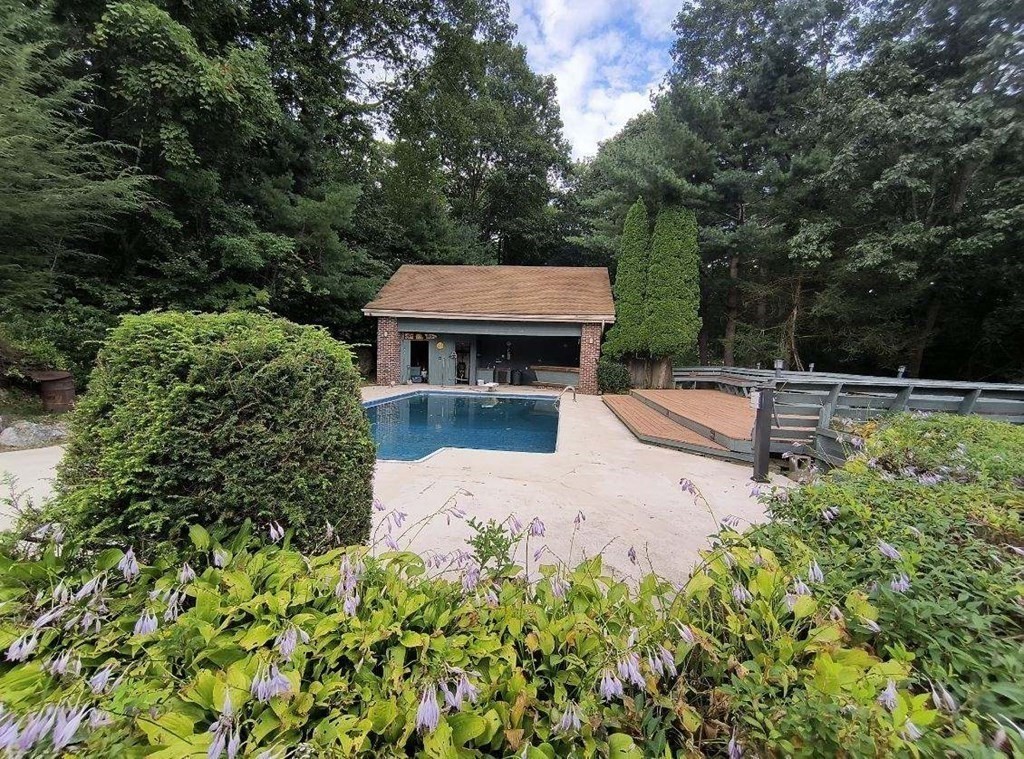 8 Birch Bluff Road Montgomery, MA 01085 - Photo 8 of 41 an aerial view of a house with swimming pool and garden