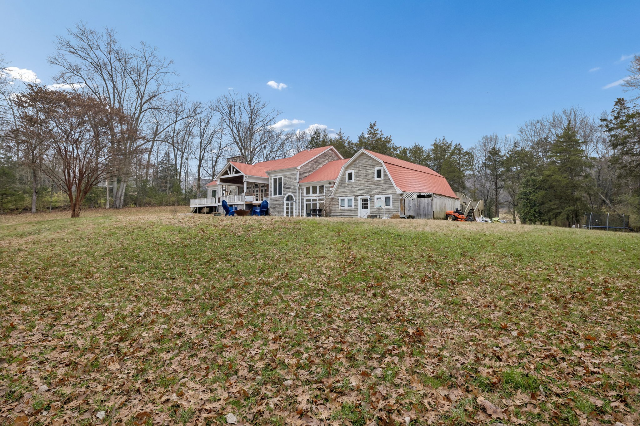6394 Temple Road Franklin, TN 37069 - Photo 5 of 8 a view of a house with a yard and sitting area