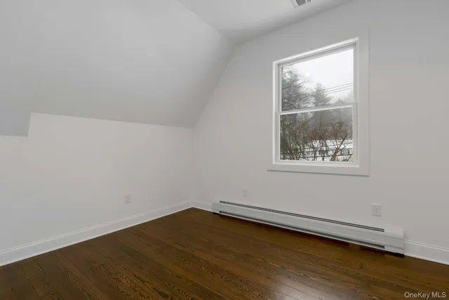 a view of small space with wooden floor