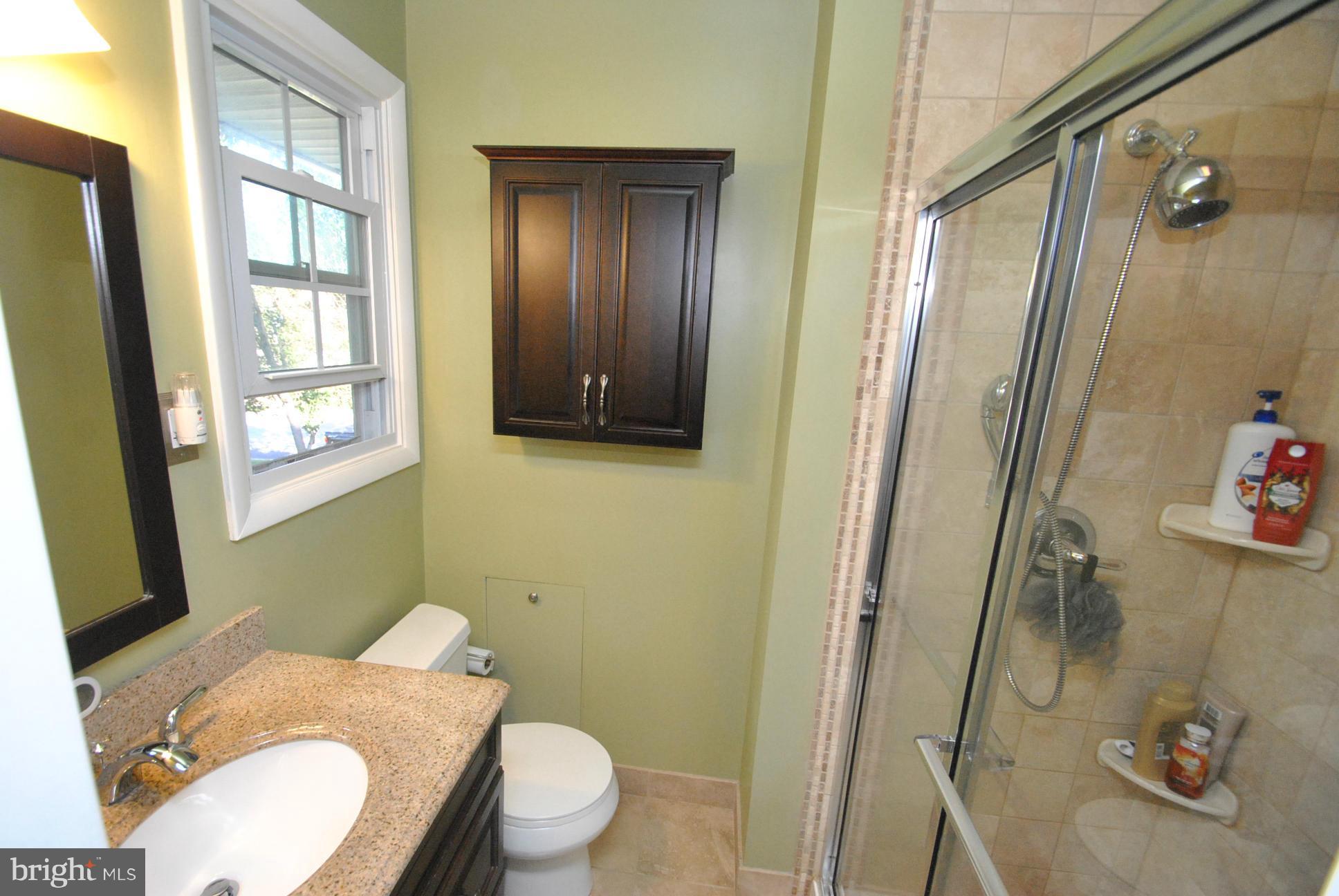 8128 Conduit Road Baltimore, MD 21234 - Photo 13 of 23 OWNERS SUITE UPDATED FULL BATH