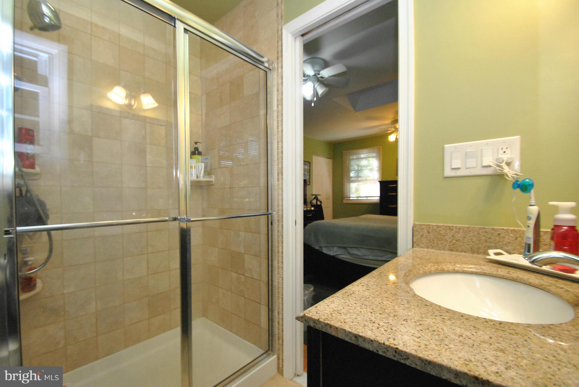 8128 Conduit Road Baltimore, MD 21234 - Photo 14 of 23 OWNERS SUITE UPDATED FULL BATH