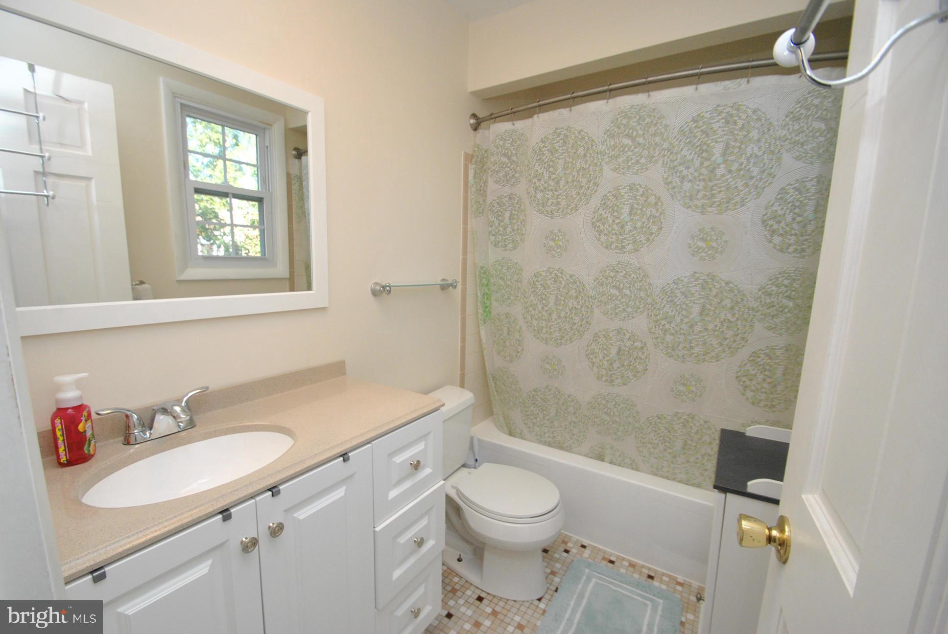 8128 Conduit Road Baltimore, MD 21234 - Photo 17 of 23 UPPER LEVEL HALL FULL BATH