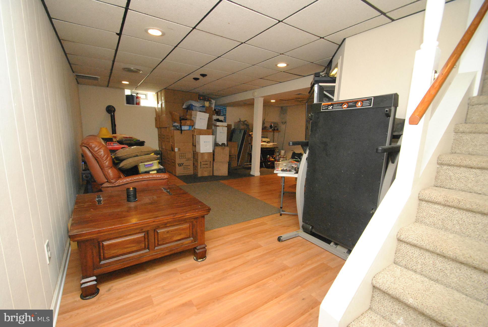 8128 Conduit Road Baltimore, MD 21234 - Photo 19 of 23 FULLY FINISHED WALKOUT BASEMENT W/PELLET STOVE