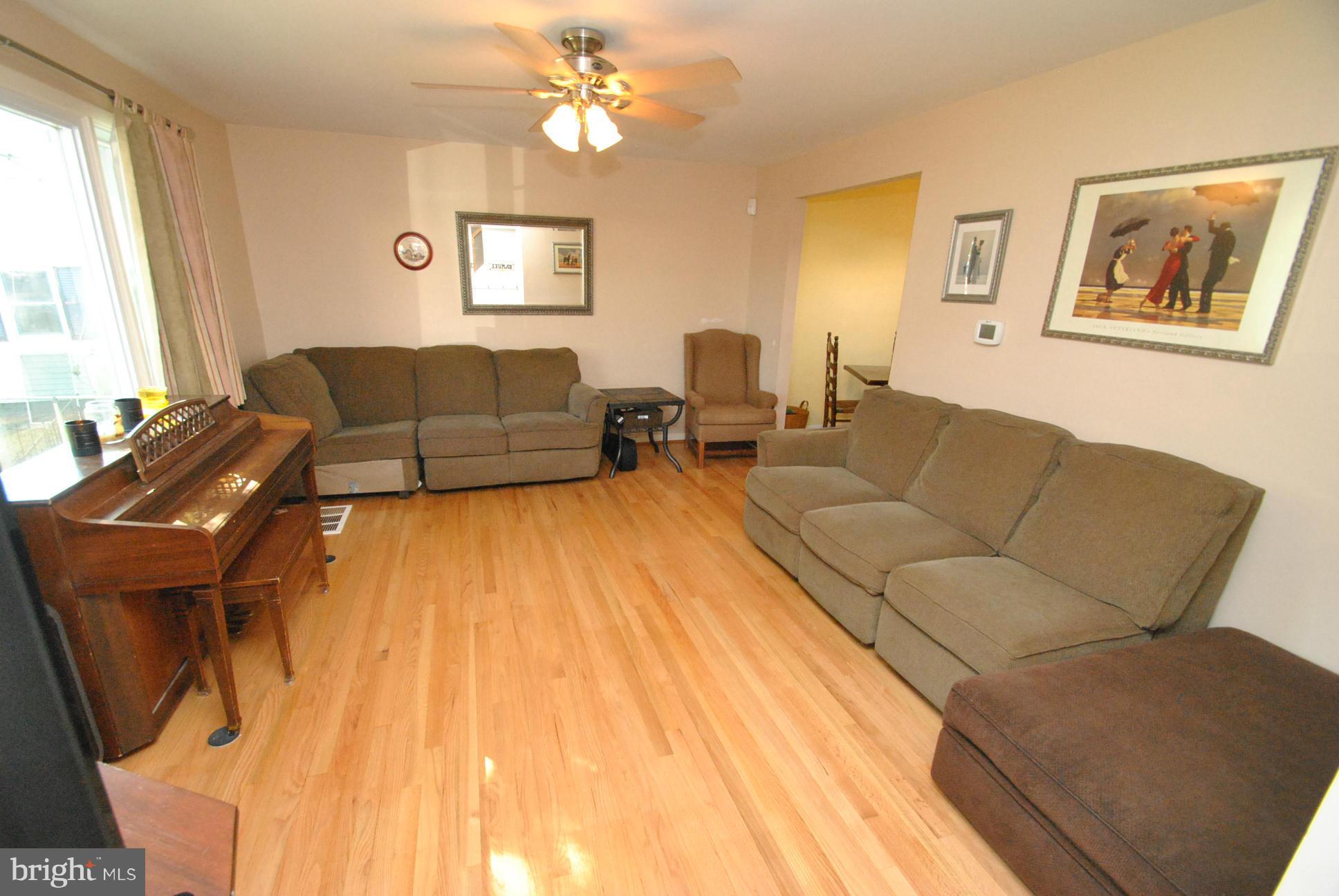 8128 Conduit Road Baltimore, MD 21234 - Photo 3 of 23 GORGEOUS HARDWOOD FLOORING & NEUTRAL COLORS
