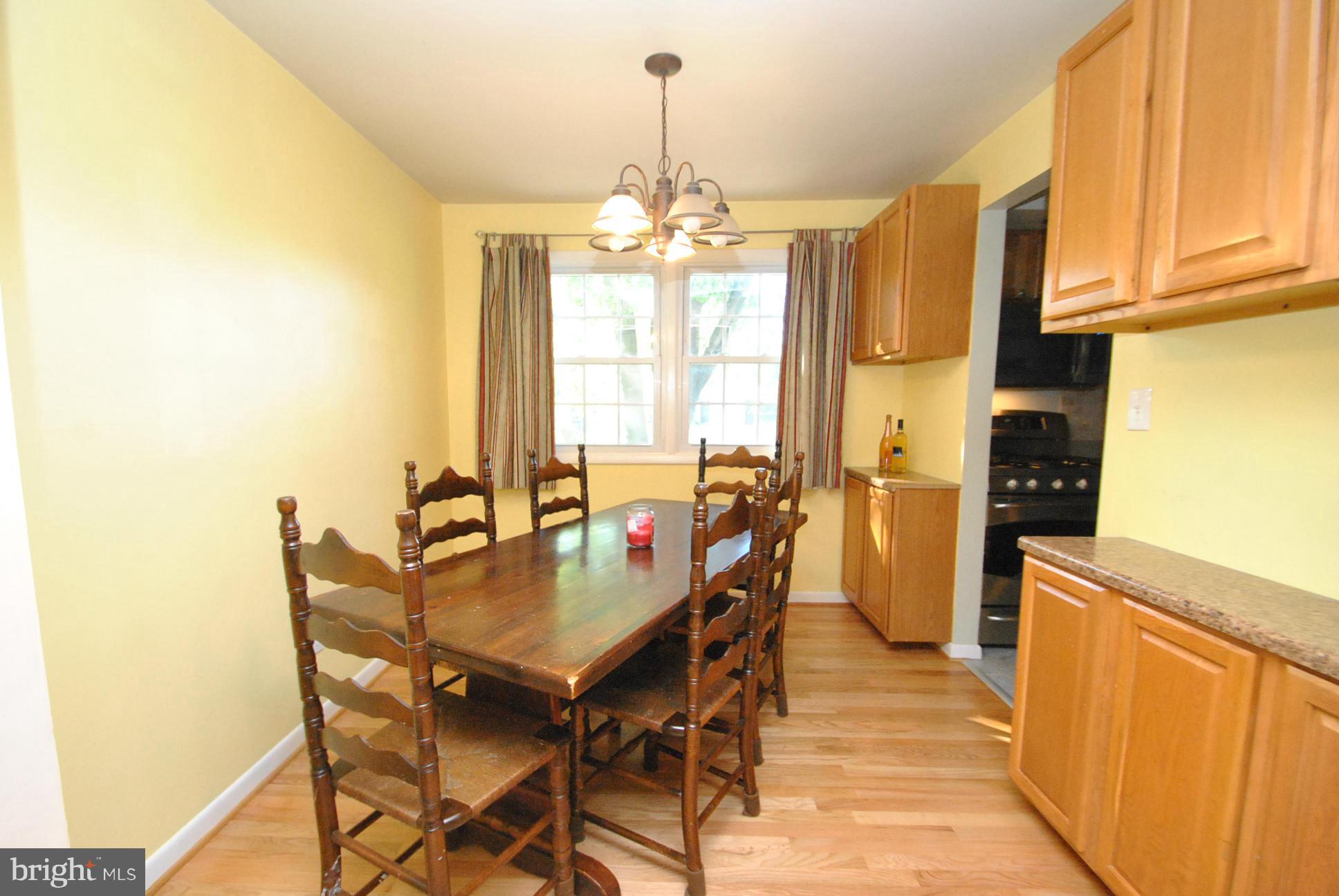 8128 Conduit Road Baltimore, MD 21234 - Photo 7 of 23 SEPARATE DINING ROOM - GORGEOUS HARDWOOD FLOORS