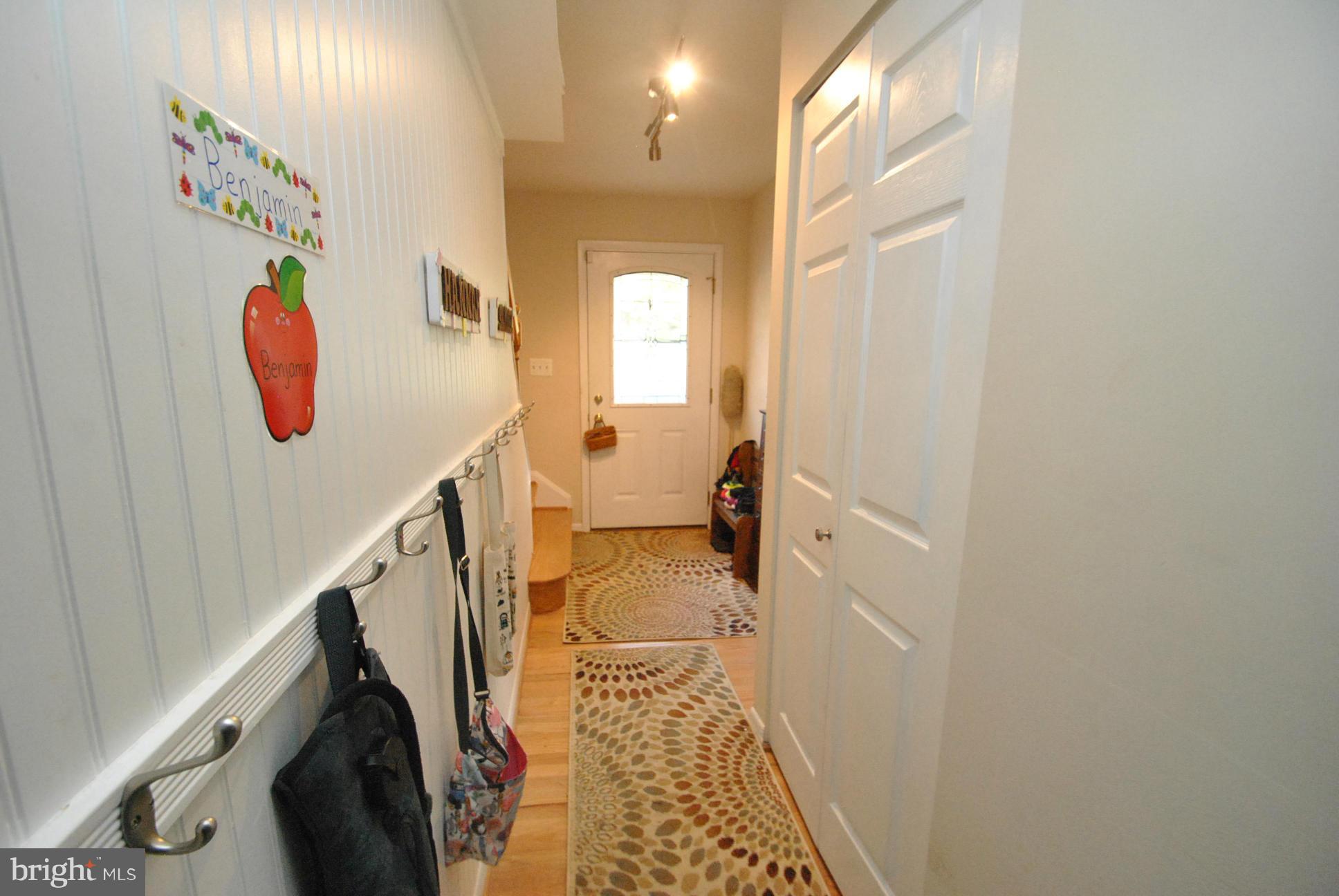 8128 Conduit Road Baltimore, MD 21234 - Photo 9 of 23 MAIN LEVEL HALLWAY