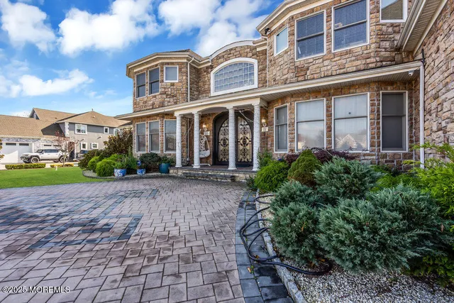 a living room with lots of furniture and a rug