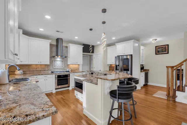 a white bath tub sitting next to a window