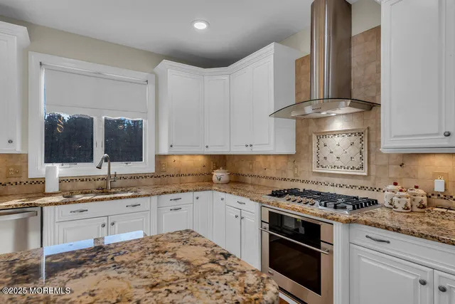 a view of a house with a backyard porch and sitting area