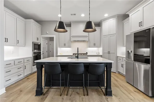 $565,000 | 1521 Southwest Arbormill Terrace, Lee's Summit, MO 64082