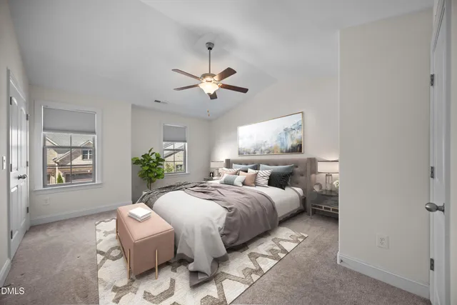 a living room with stainless steel appliances granite countertop furniture wooden floor and a view of kitchen