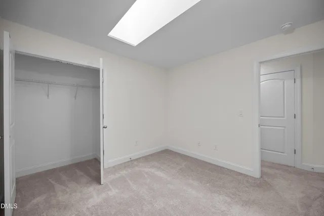 a bathroom with a toilet and a bathtub