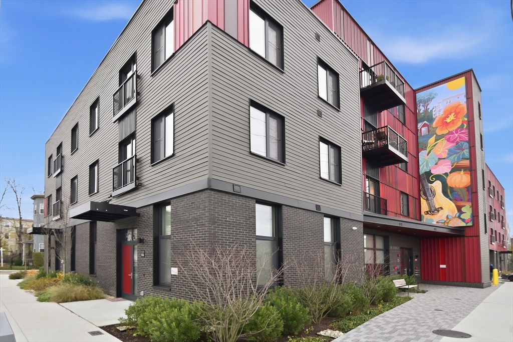 10 Stonley Road, Unit 102 Boston, MA 02130 - Photo 13 of 13 a front view of a multi story residential apartment building