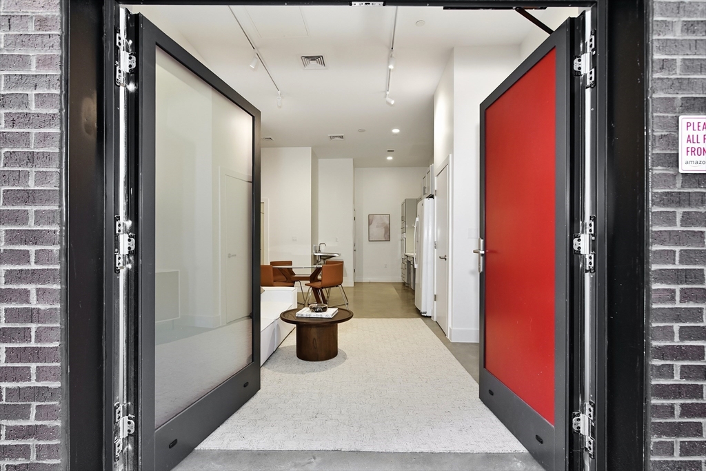 10 Stonley Road, Unit 102 Boston, MA 02130 - Photo 3 of 13 a very nice looking room with a dining table