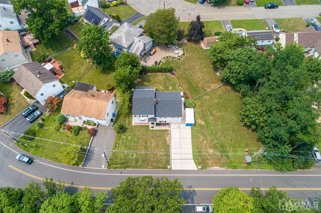301 Colonia Boulevard Colonia, NJ 07067 - Photo 3 of 51 an aerial view of residential houses with outdoor space and street view