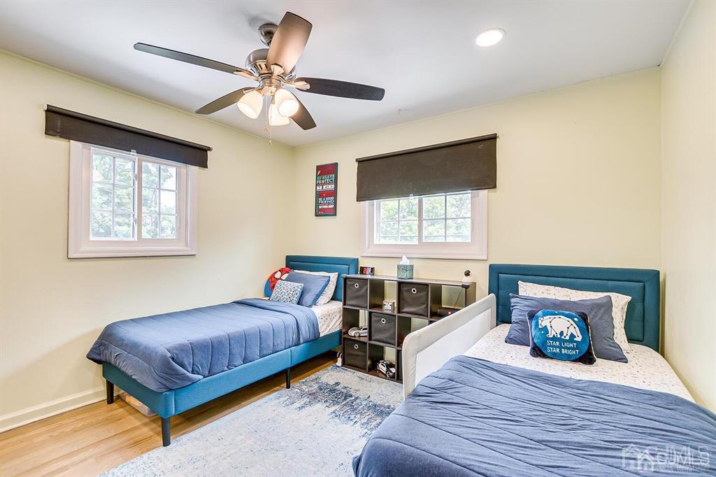 301 Colonia Boulevard Colonia, NJ 07067 - Photo 32 of 51 a bedroom with a bed and window
