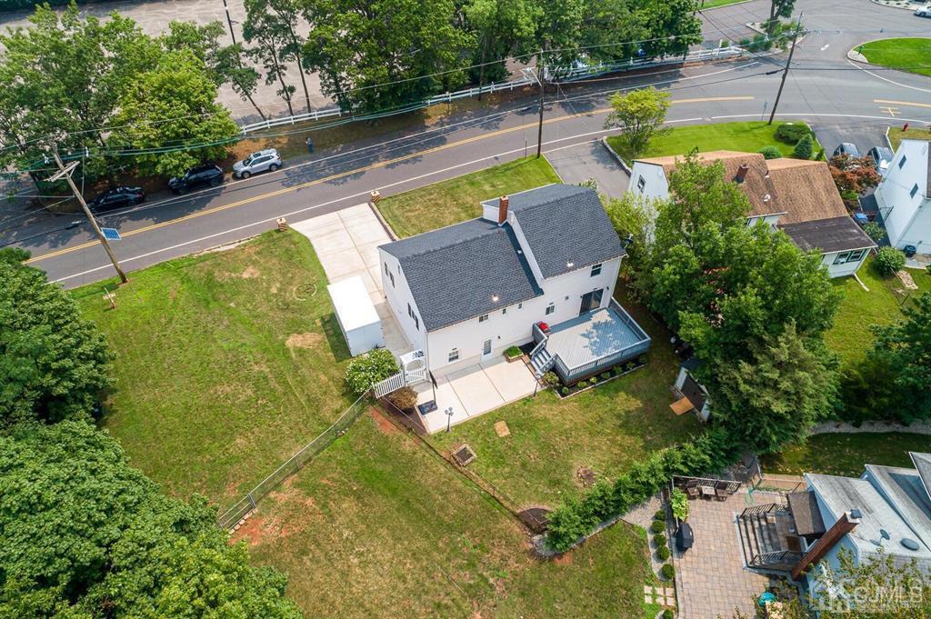 301 Colonia Boulevard Colonia, NJ 07067 - Photo 45 of 51 an aerial view of a house with swimming pool and outdoor seating