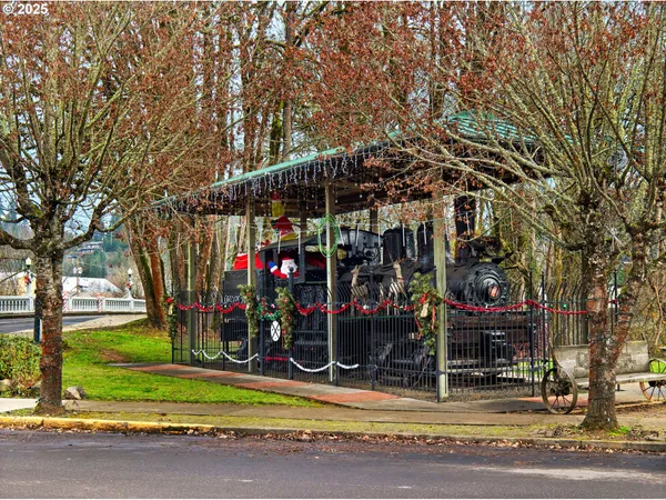 a view of street along with trees