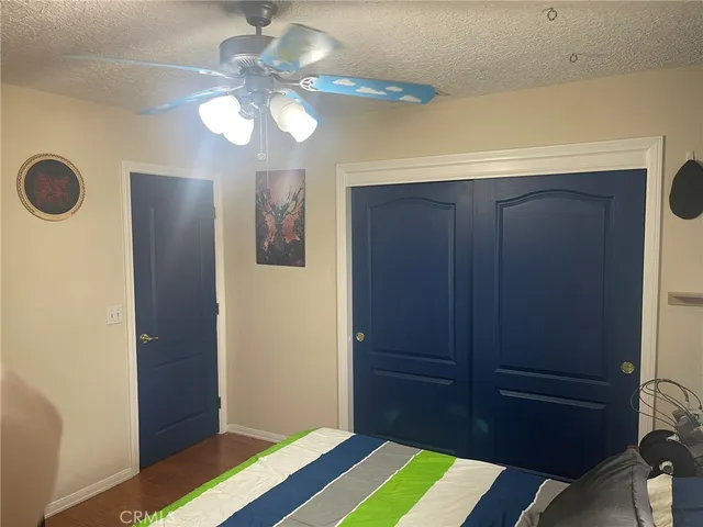a dining room with furniture and a chandelier
