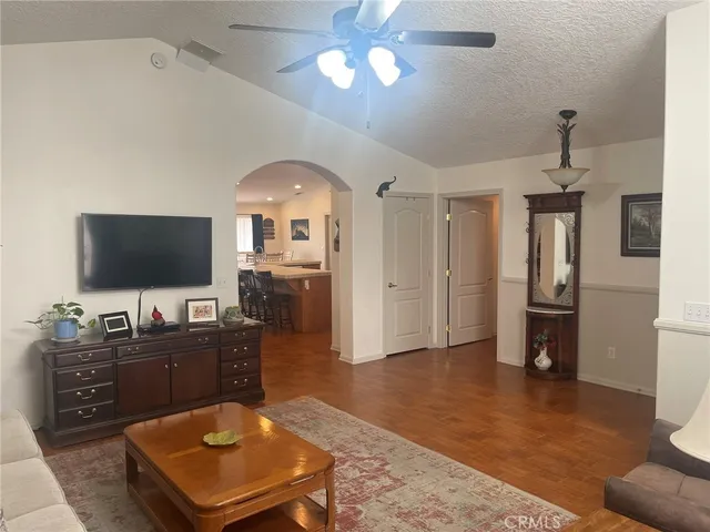 a bedroom with a bed and a lamp