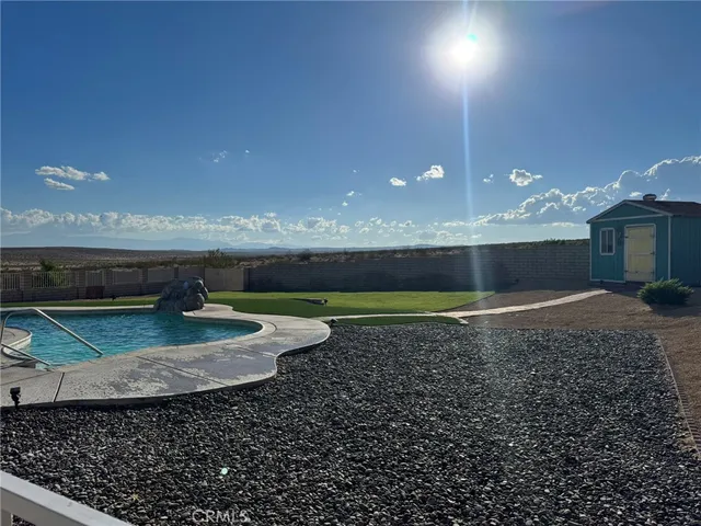 a bathroom with a sink toilet and a mirror