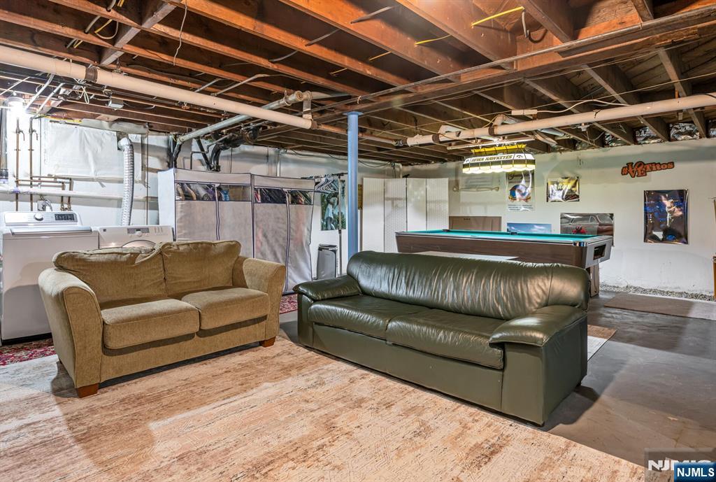 431 Goffle Road Wyckoff, NJ 07481 - Photo 15 of 19 a balcony with furniture and a couch