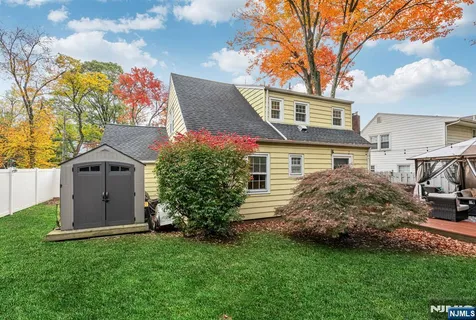 a view of a house with a garden