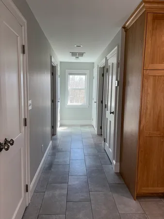 a bathroom with a glass door shower