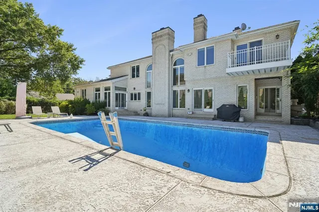 a view of a house with a park