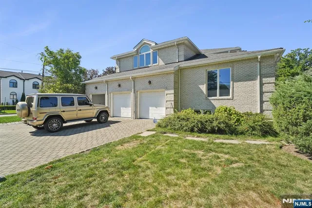 a house view with a garden space