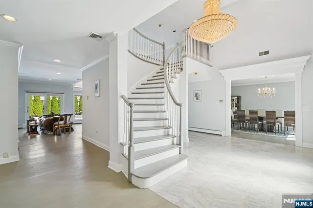 a view of dining room with furniture and wooden floor